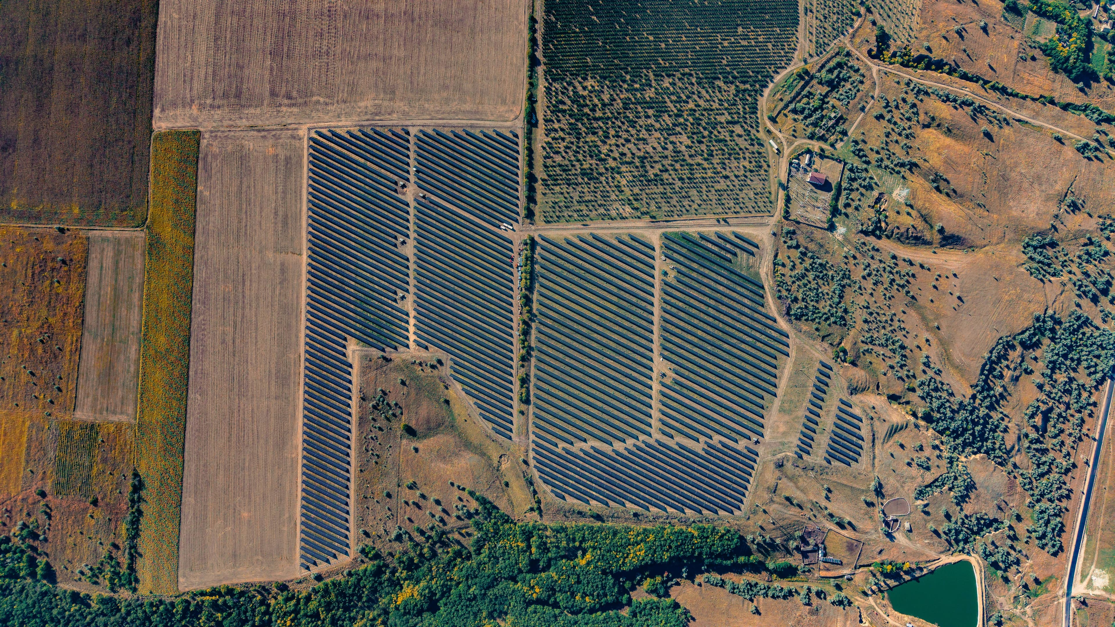 Aerial view of farmland and solar energy infrastructure